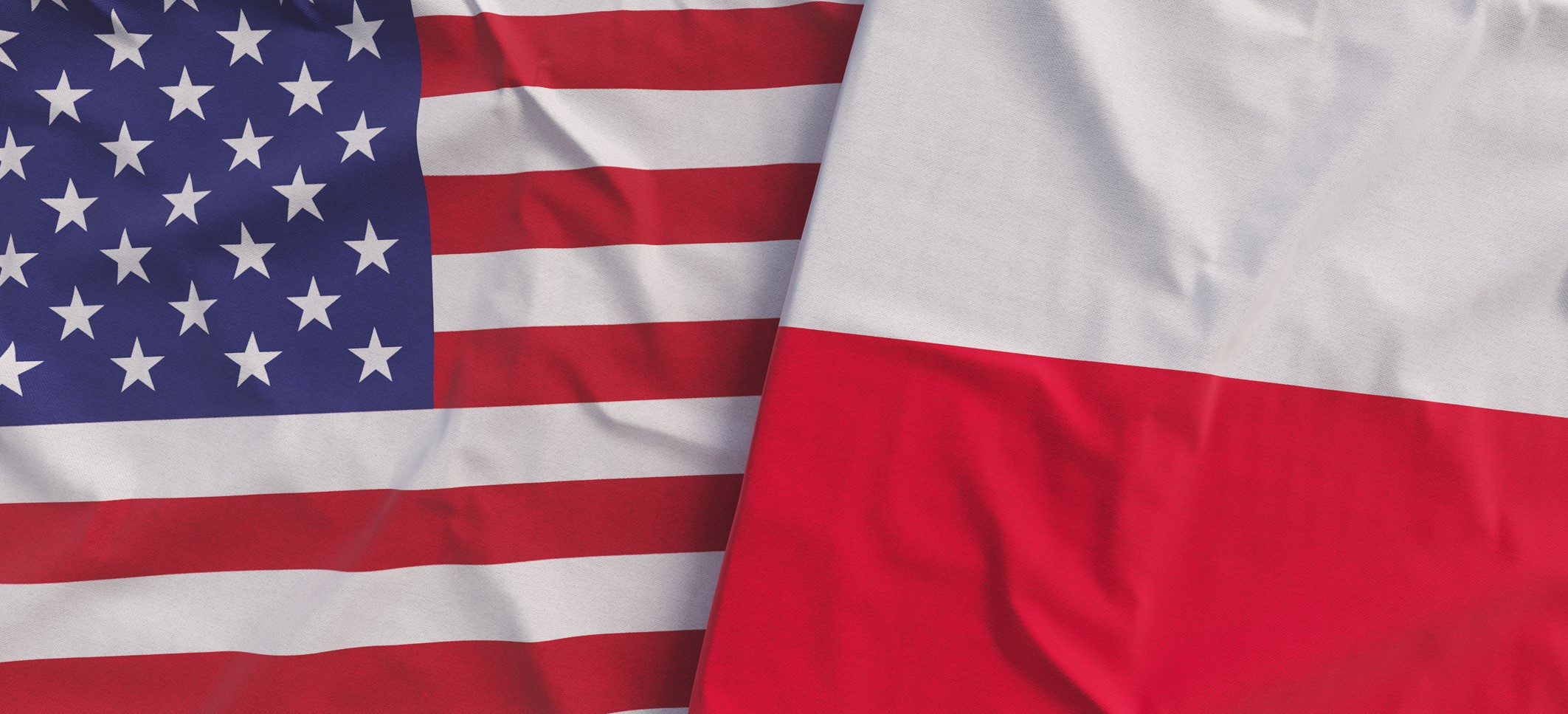 Flagi USA i Polski. Źródło: freepik