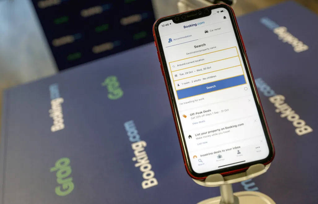 Booking jest wiodącym przedsiębiorstwem dostarczającym usługę rezerwacji noclegów online, fot. PAP/EPA/WALLACE WOON
